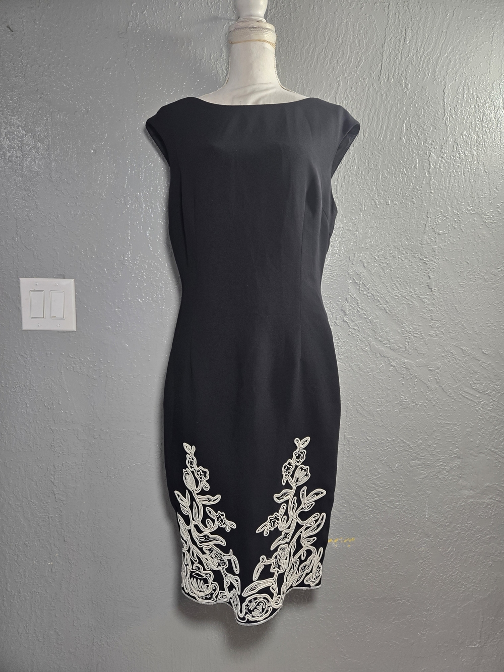 Elegant Black Sheath Dress with White Embroidered Hem